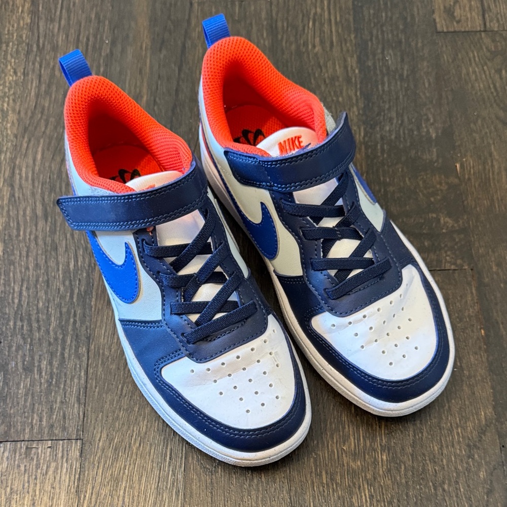 Nike Kids Navy and White Sneakers with Orange Accents